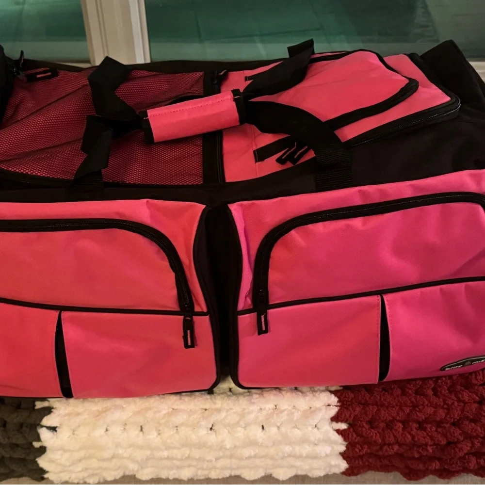 Pink and Black Garment Bag with Wheels 30” long• 16” wide• 14” high